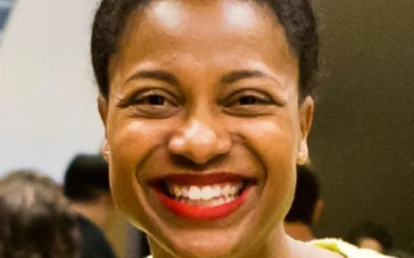 Headshot of Dionne
